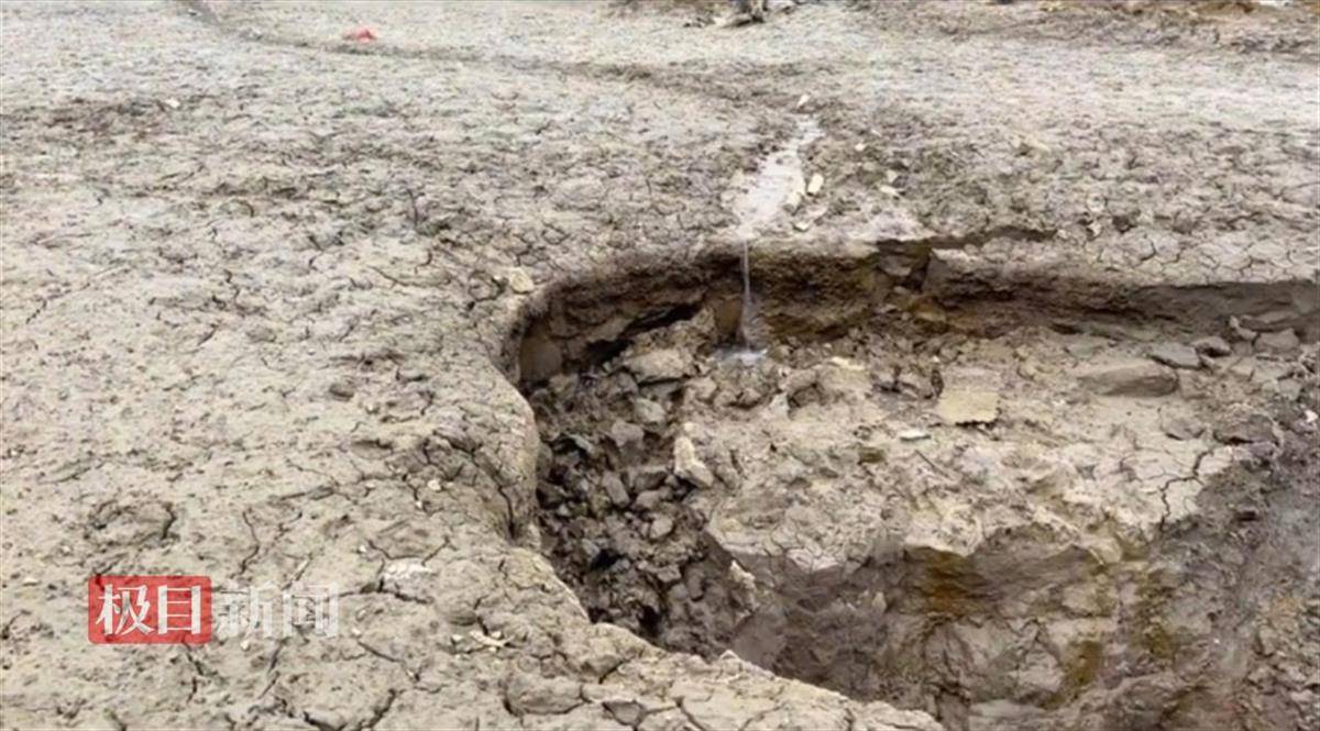 上百亩水库被曝枯竭<strong></p>
<p>链圈</strong>，库底惊现大坑，重庆沙坪坝：正在整治修复